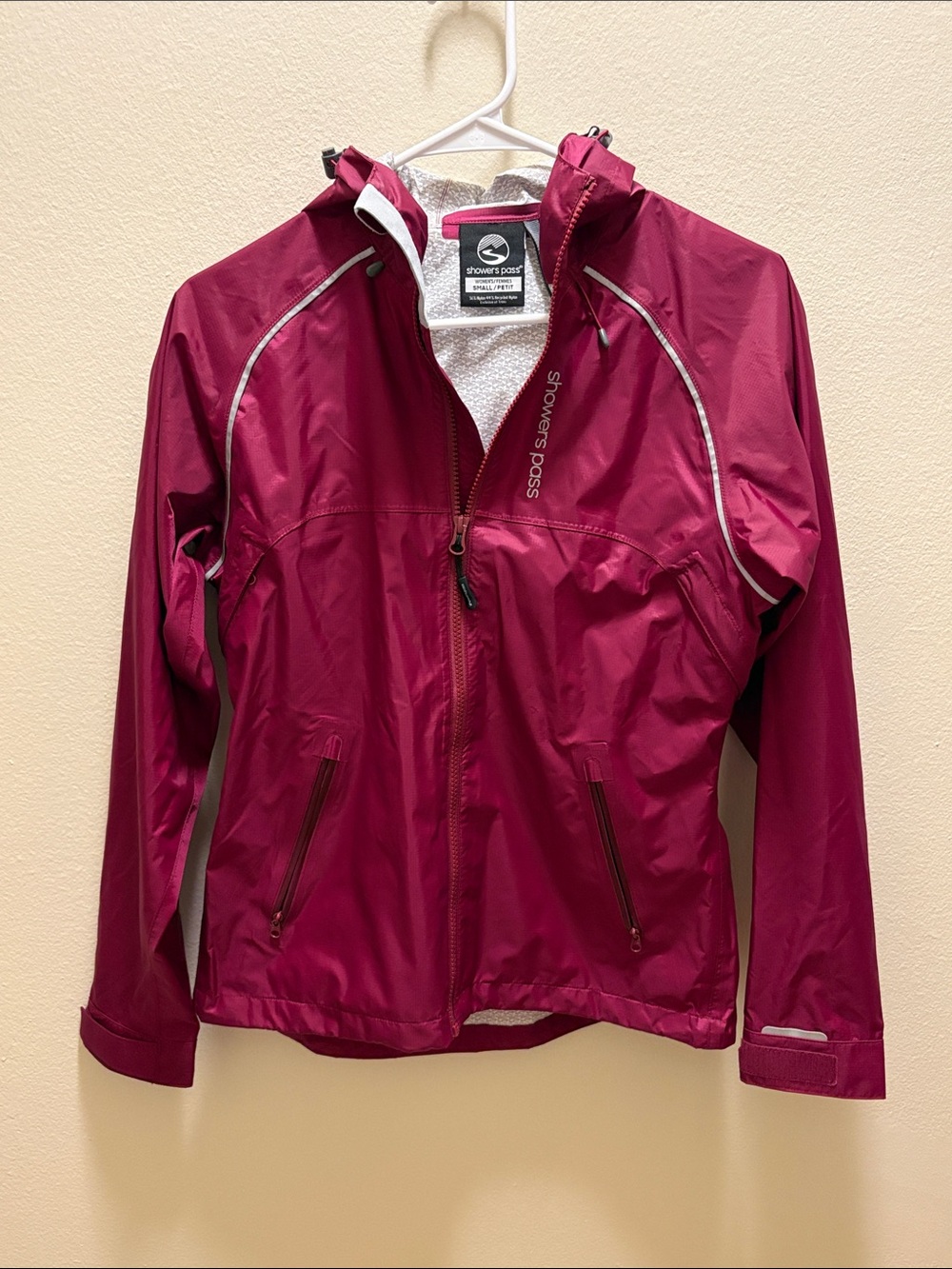 Showers Pass pink hiking jacket